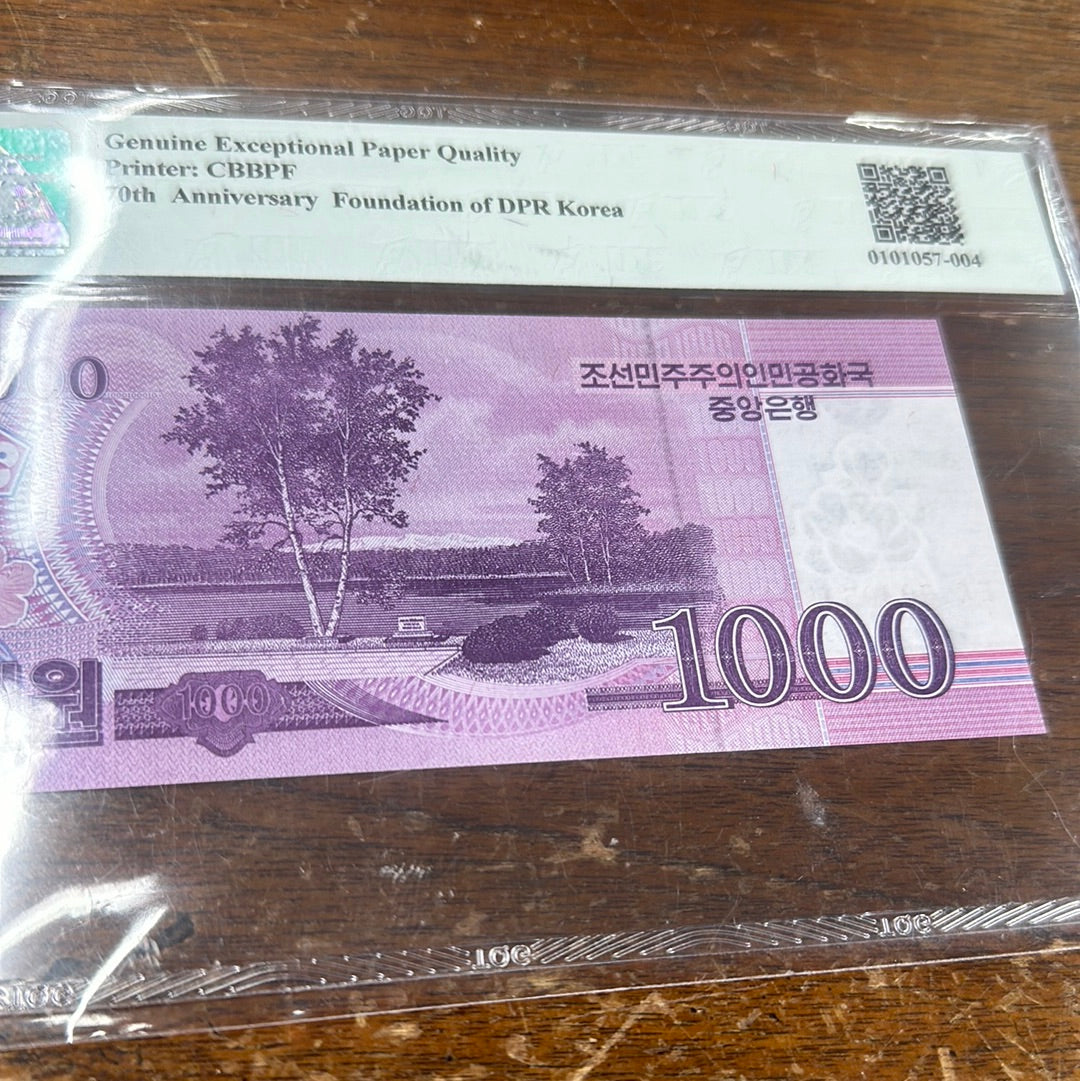 DPRK CENTRAL BANK GEM UNC Exceptional Paper Quality 1000 Won 2018 70th Anniversary DPRK Commemorative TQG 66 PPQ LOW SERIAL NUMBER - Pawn Man Store