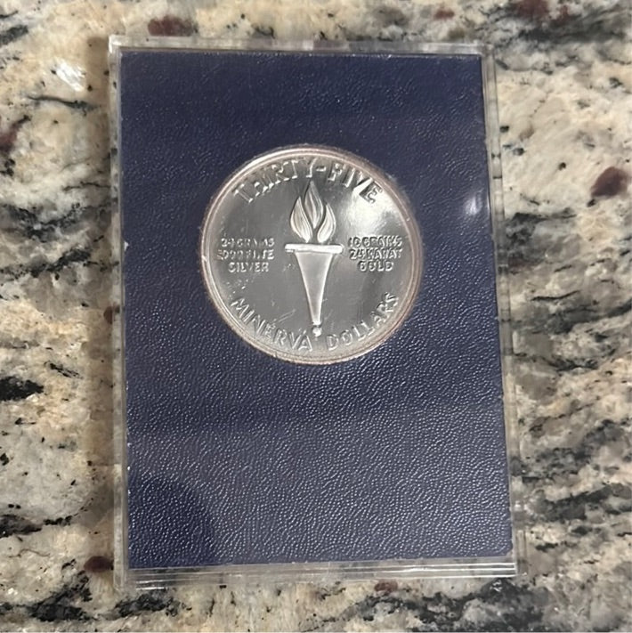 BU 1973 Minerva Dollar .999 Silver overlayed .999 Gold 10k minted