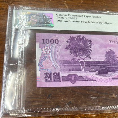 DPRK CENTRAL BANK GEM UNC Exceptional Paper Quality 1000 Won 2018 70th Anniversary DPRK Commemorative TQG 66 PPQ LOW SERIAL NUMBER - Pawn Man Store