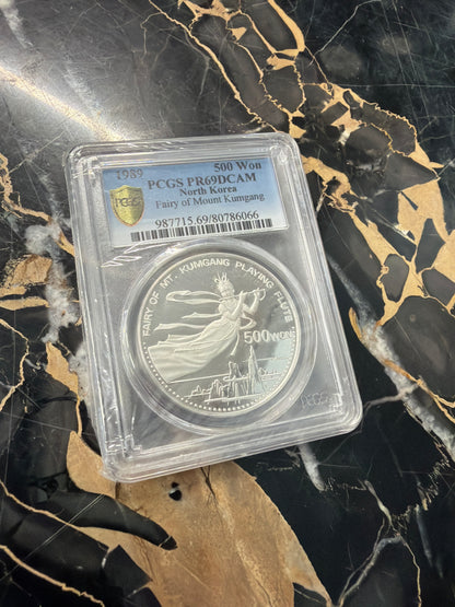 1989 PCGS DPRK 🇰🇵 500 Won Fairy Of Mount Kumgang 1 oz .999 Silver PR69DCAM