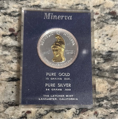 BU 1973 Minerva Dollar .999 Silver overlayed .999 Gold 10k minted
